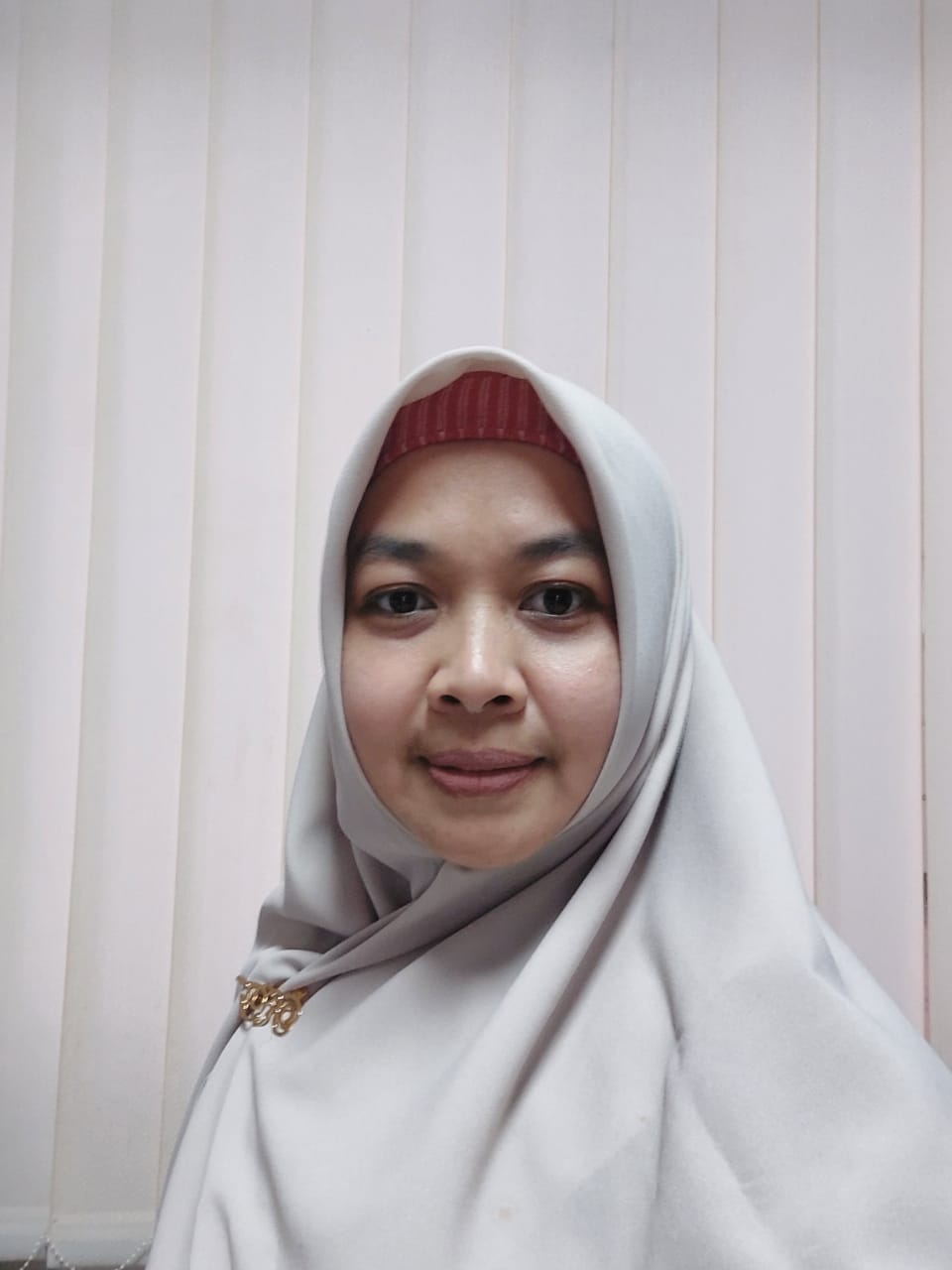 Rahmi Fauzia, S.Kom